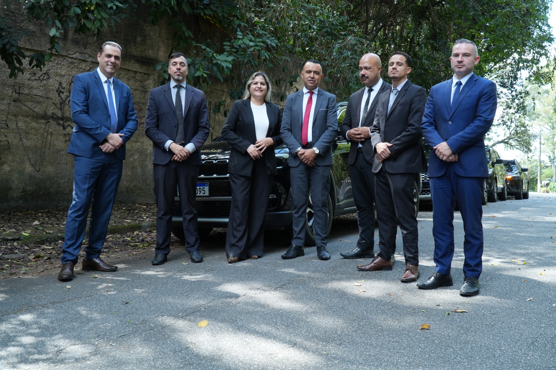 Transfersafe executive chauffeur team in front of the fleet